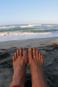 Nothing happier than skittle-colored toes on the beach.