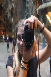 Snapping a reflected selfie with my Canon 600D.