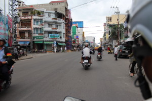 Riding on the back of a motorcycle taxi in Vietnam